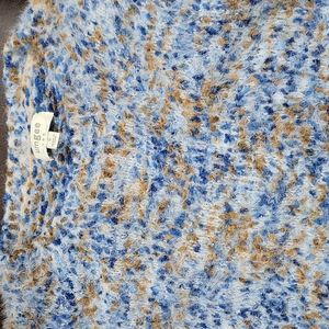 Two sweaters and two scarves